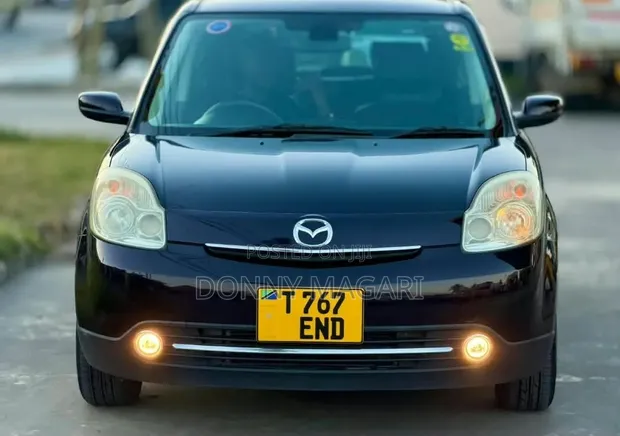 Mazda Verisa 2009 Maroon - 1