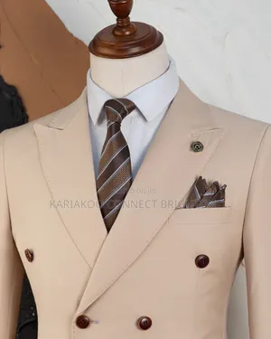 Beige Double-Breasted Three-Piece Suit by JOSLINO