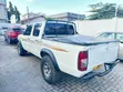 Nissan Hardbody 2015 Nyeupe - 1