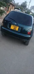 Toyota Starlet 2003 Beige - 1