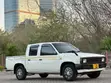 Nissan DoubleCab 2000 White - 1