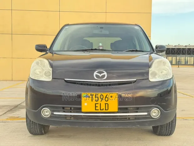 Mazda Verisa 2010 Brown - 1