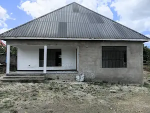 Kiwanja cha Acre 1 chenye Nyumba Mbili Kinauzwa, Ukonga