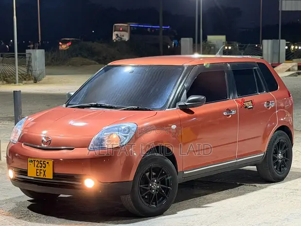 Mazda Verisa 2010 Red - 1