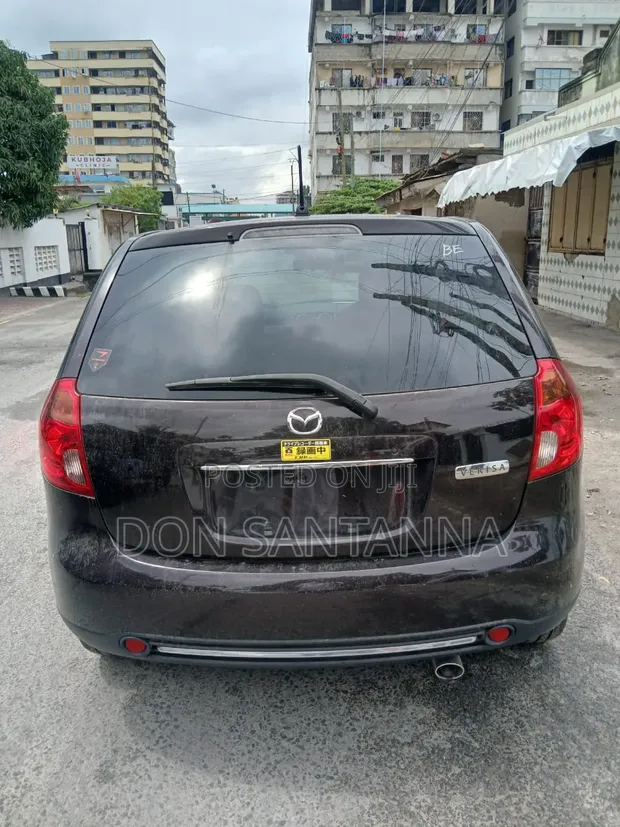 Mazda Verisa 2014 Maroon - 1