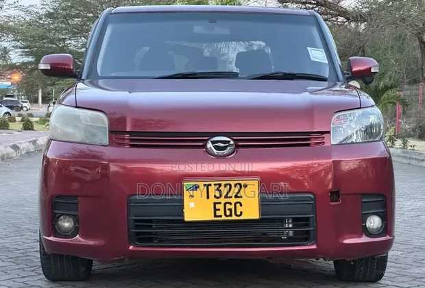 Toyota Corolla Rumion 2009 Maroon - 1