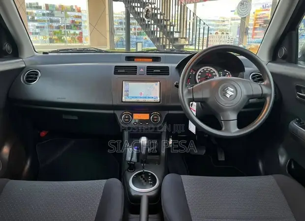 Suzuki Swift 2009 Silver - 1