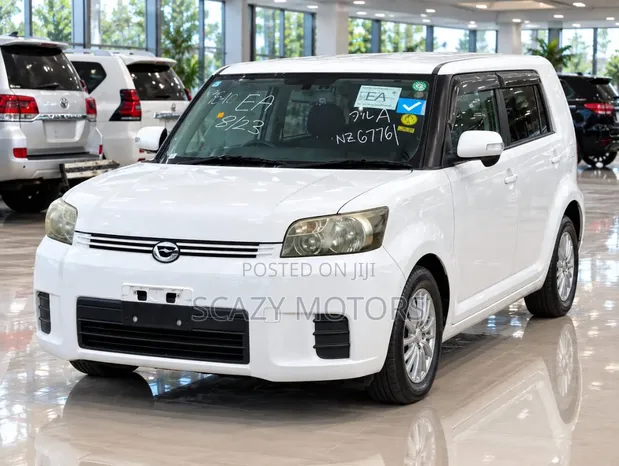 Toyota Corolla Rumion 2009 Nyeupe - 1
