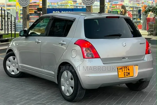 Suzuki Swift 2009 Silver - 1