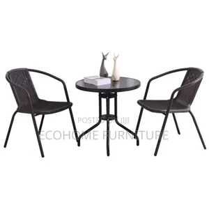 Outdoor Rattan Chair and Glass Table