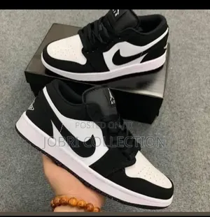 Air Jordan 1 Low Black and White Suede Sneakers