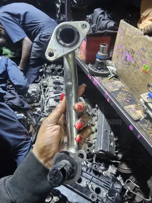 Bomba la EGR/Coolant Oil Bypass kwa Mazda Demio S5