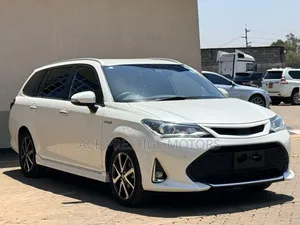 Toyota Corolla Fielder WXB Hybrid 2019 White