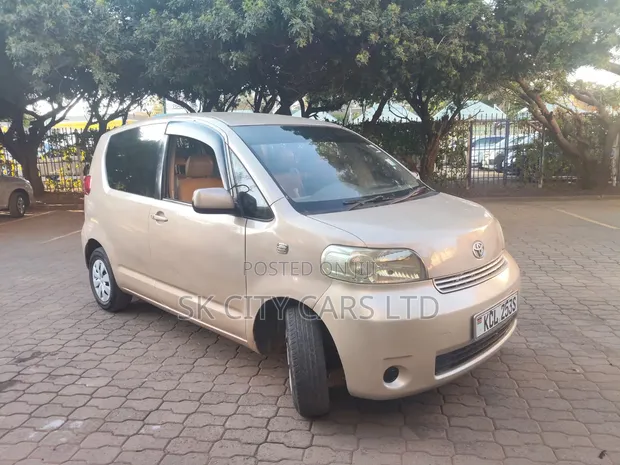 Toyota Porte 2009 Beige - 1