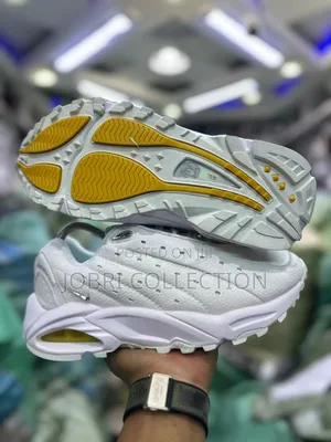 Nike Hot Step Air Drake NOCTA "Triple White" Sneakers