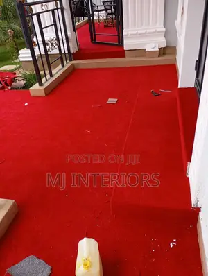 Red Wall-to-Wall Carpet Installation for Offices