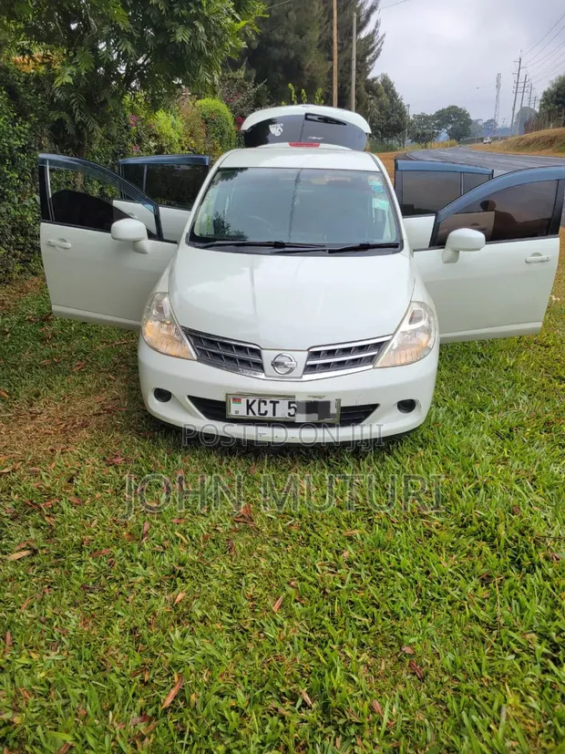 Nissan Tiida 2011 White - 1