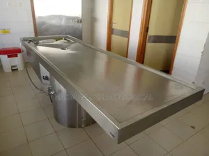 Locally Made Autopsy Table With a Tound Base(Stainless Steel)