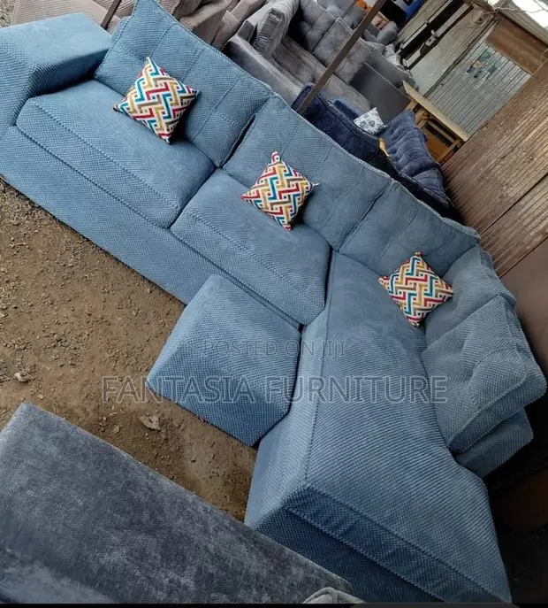 5 Seater Light Grey Textured Chaise Sofa + Footrest - 1