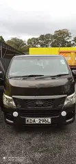 Isuzu Como Van 2013 Brown - 1