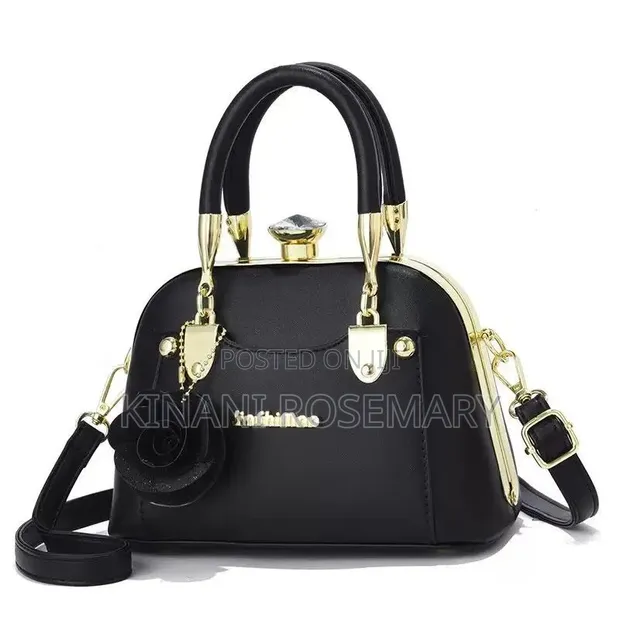 Elegant Black Evening Bag with Gold Accents - 1