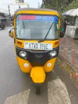 Bajaj RE 2023 Yellow - 1