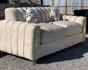 2 Seater Beige Ribbed Sofa with Gold Legs