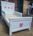 Brand New White Kids Bed with Pink Star & Crown Accents - 1