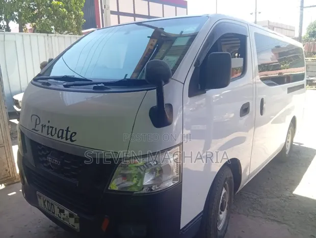 Isuzu Como 2015 White - 1