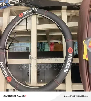 Black Nissan Textured Grip Steering Wheel Cover
