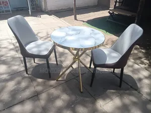 Brand New Dining Set with Padded Cushions