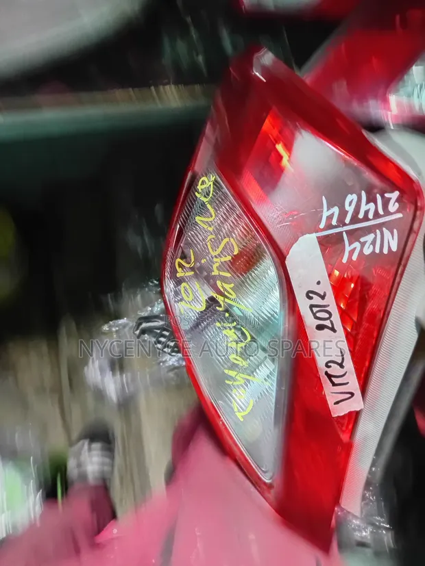 Toyota Vitz 2012 Tail Lights (Used) - 1