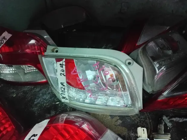 Daihatsu Mira 2014 Tail Lights (Used) - 1