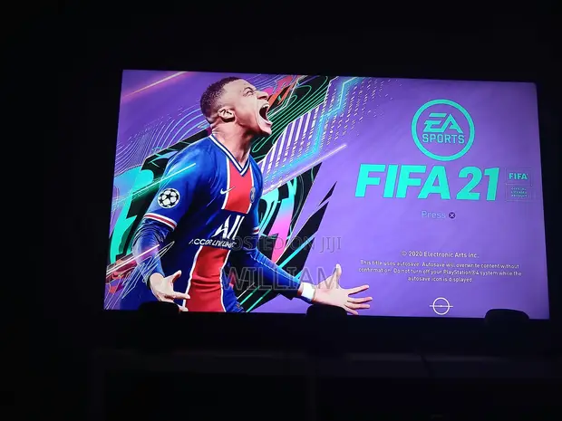 PS4 Slim 500GB Console Bundle with 2 Controllers & FIFA 21 - 1