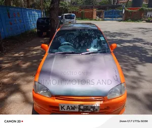 Toyota Starlet 1999 Rangi ya Chungwa