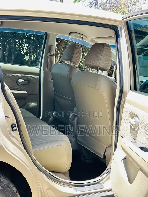 Nissan Tiida 2010 Gold - 1