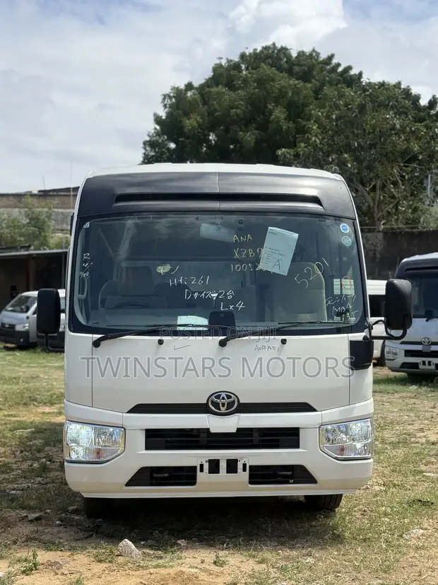 Toyota Coaster 2019 Beige - 1