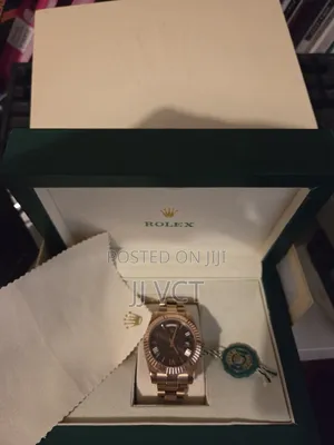 Rolex Day-Date with Box and Papers
