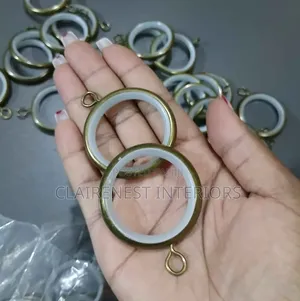 Antique Bronze Round Curtain Rings with Inner Plastic Lining