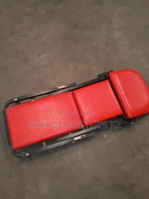 Mechanic's Creeper Seat - Padded Red Rolling Workshop Stool