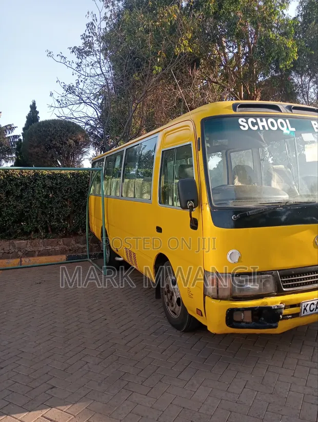Toyota Coaster 2015 White - 1