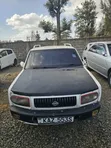Nissan Rasheen 2000 White - 1