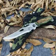 Serrated Stainless Steel Outdoor Knife with Green Textured Handle and Sheath - 1
