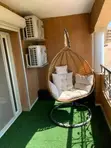 Premium Woven Rattan Outdoor Hanging Swing Chair - 1