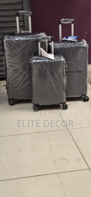 3-Piece Unbreakable Rubber Suitcase Set - 360° Spinner Wheels