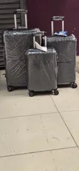 3-Piece Unbreakable Rubber Suitcase Set - 360° Spinner Wheels - 1