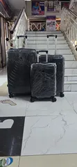 3-Piece Unbreakable Rubber Suitcase Set - 360° Spinner Wheels - 5