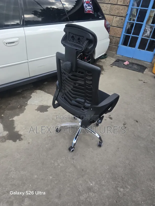 Swivel Modern Office Chair with Adjustable Headrest - 1