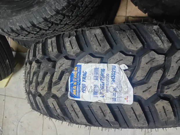 265/75R16 Maxtrek Mud Grip Tires - 1