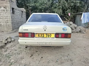 Mercedes-Benz W124 1985 - Ivory